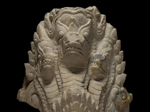 Statue of a three-headed sea monster.