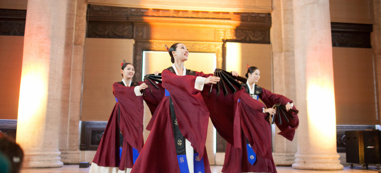 Chuseok - Three dancers with red robes performing in Samsung Hall.